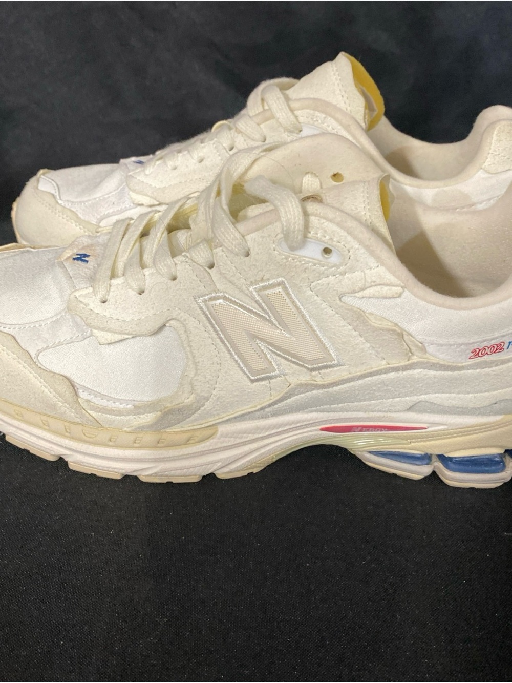New Balance Off-White Cream Sneakers with Yellow and Blue Accents